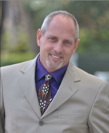 Photo of Greg S. Reid