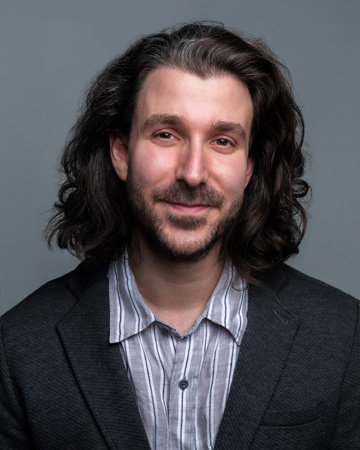 Photo of Adam Met, PhD