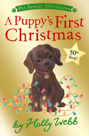 A Puppy's First Christmas by Holly Webb; illustrated by Sophy Williams